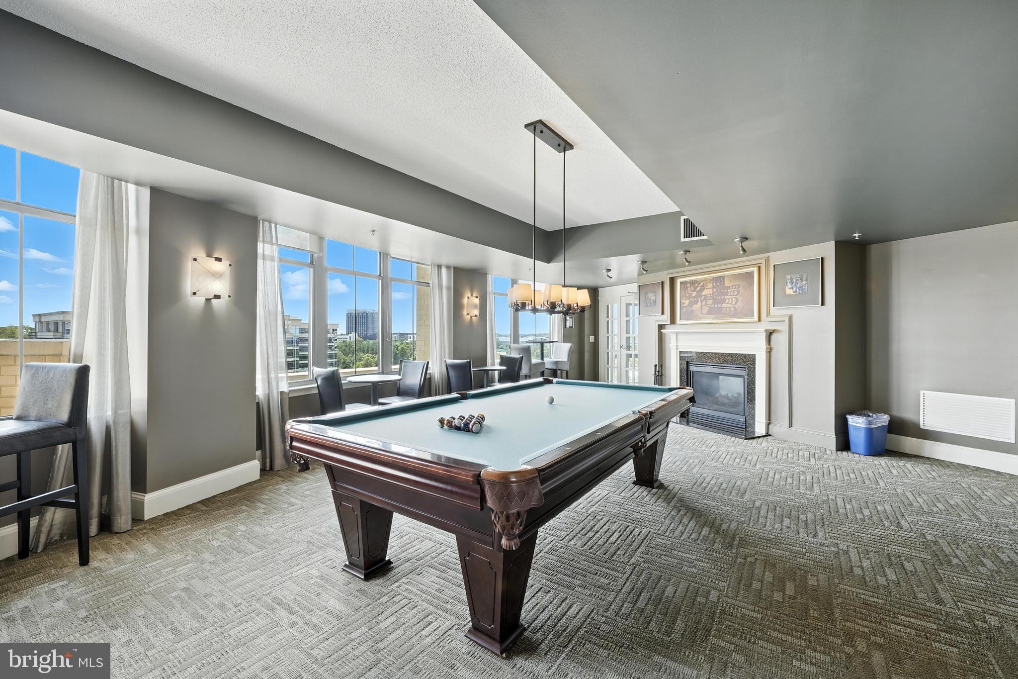11800 Sunset Hills Road, Unit 818 Reston, VA 20190 - Photo 23 of 26 a room with pool table and windows