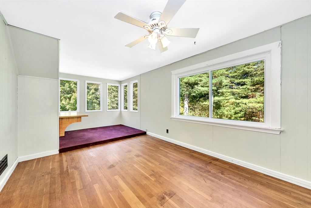 14 Pond Street Topsfield, MA 01983 - Photo 28 of 36 wooden floor in an empty room with a window