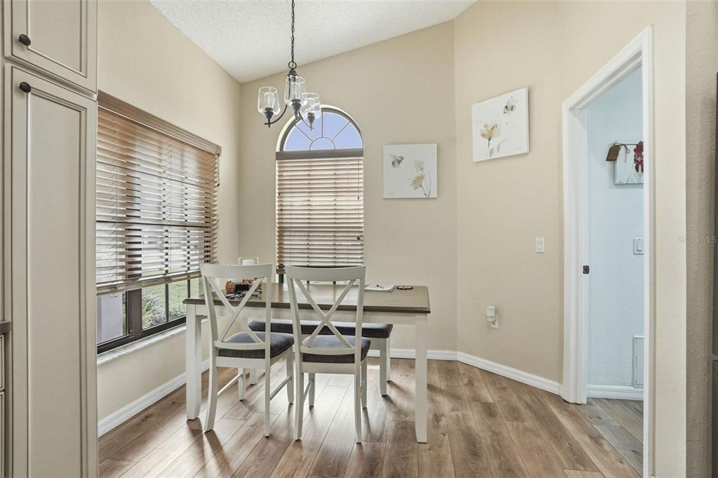 11437 Deercroft Court Spring Hill, FL 34609 - Photo 18 of 37 a view of a dining room with furniture window and outside view