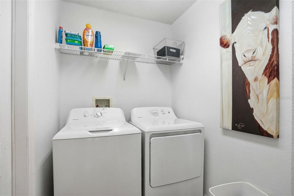 11437 Deercroft Court Spring Hill, FL 34609 - Photo 29 of 37 a utility room with dryer and washer