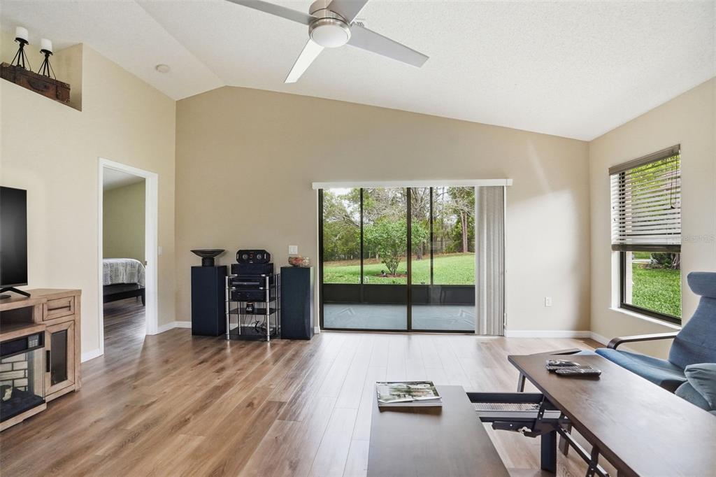 11437 Deercroft Court Spring Hill, FL 34609 - Photo 6 of 37 a bed room with furniture and a window