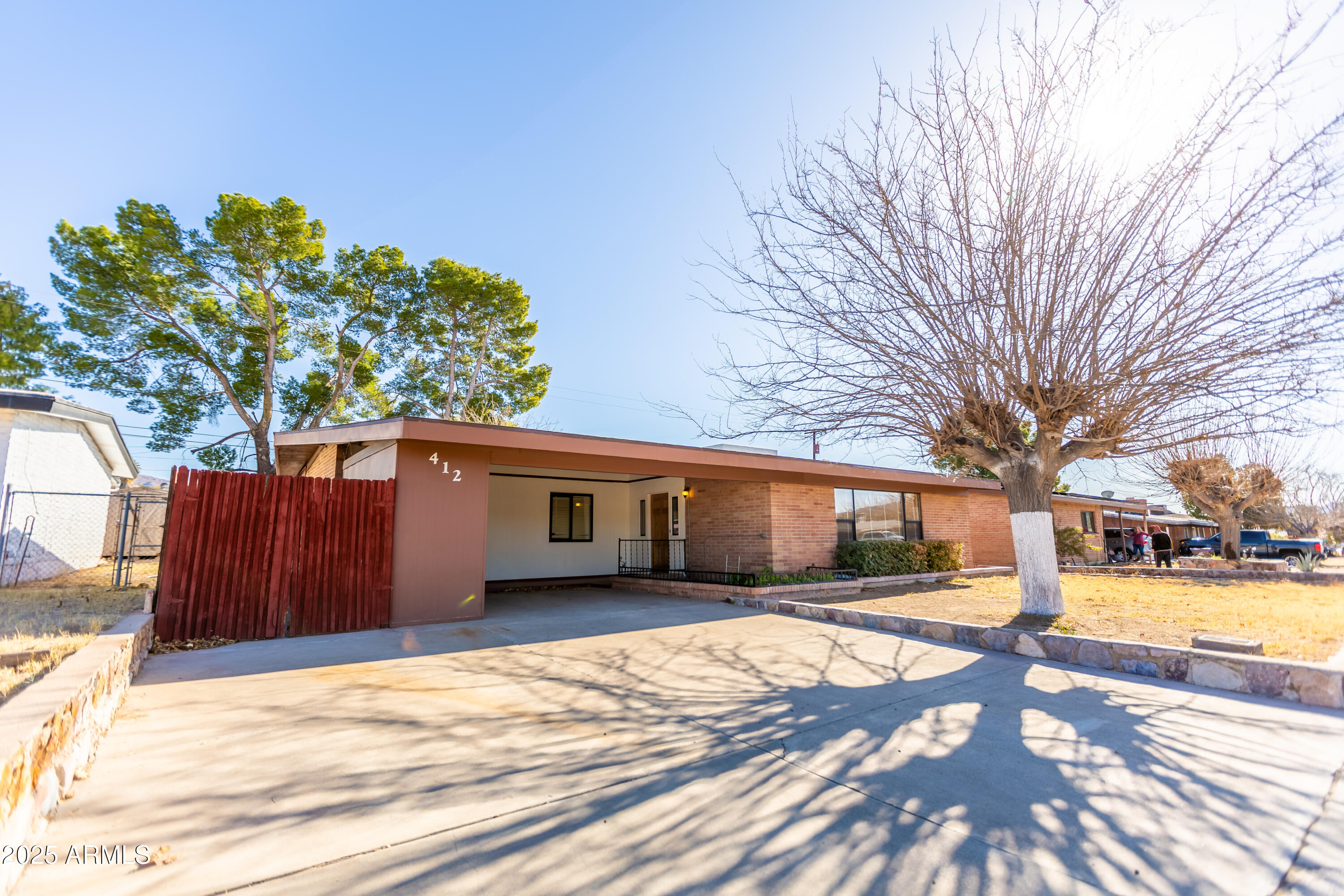 412 Fairhaven Road Kearny, AZ 85137 - Photo 1 of 36 a house with trees in the background