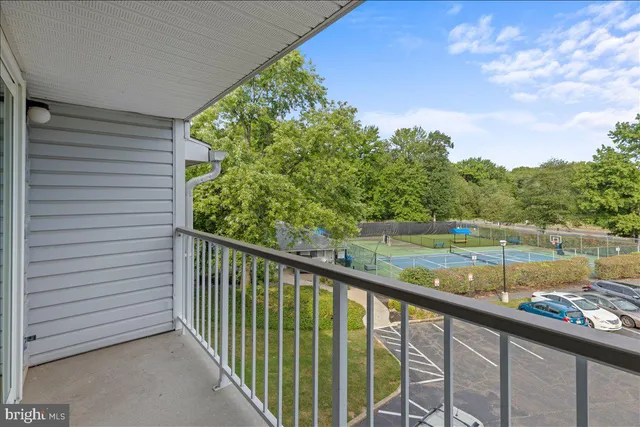 a view of a balcony with lake view