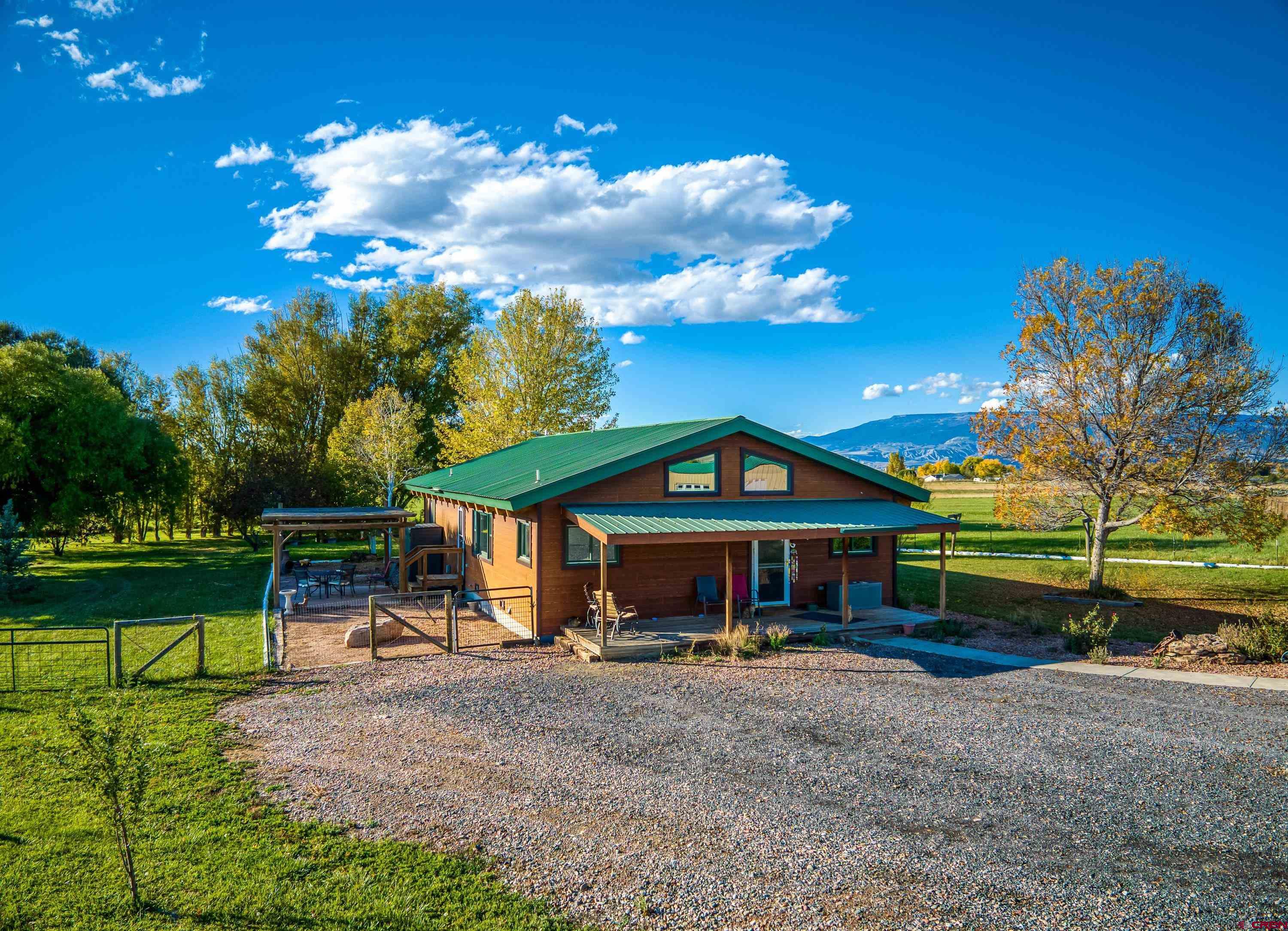 17938 B Road Delta, CO 81416 - Photo 1 of 41 a view of a house with a yard