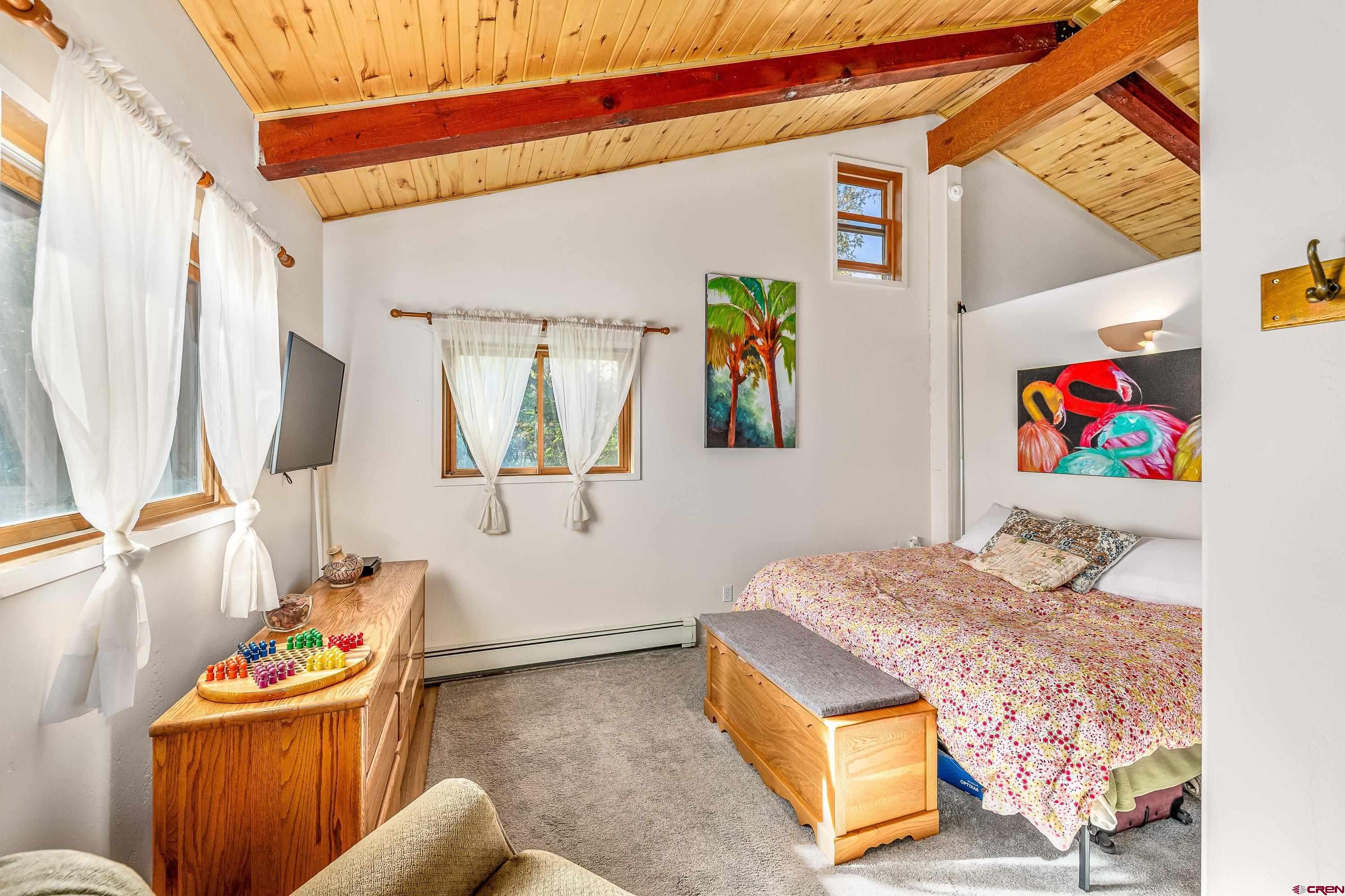 17938 B Road Delta, CO 81416 - Photo 11 of 41 a bedroom with a bed and furniture