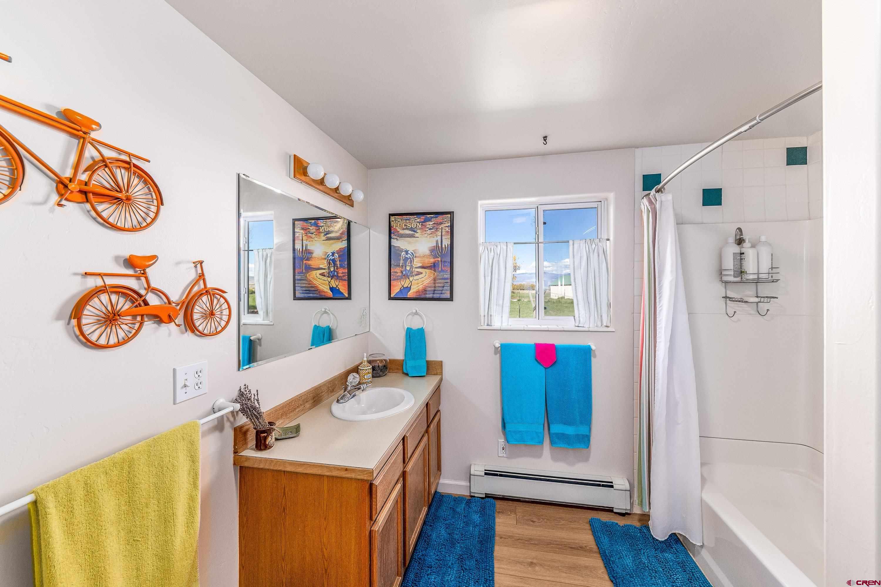 17938 B Road Delta, CO 81416 - Photo 14 of 41 a room with furniture and wooden floor