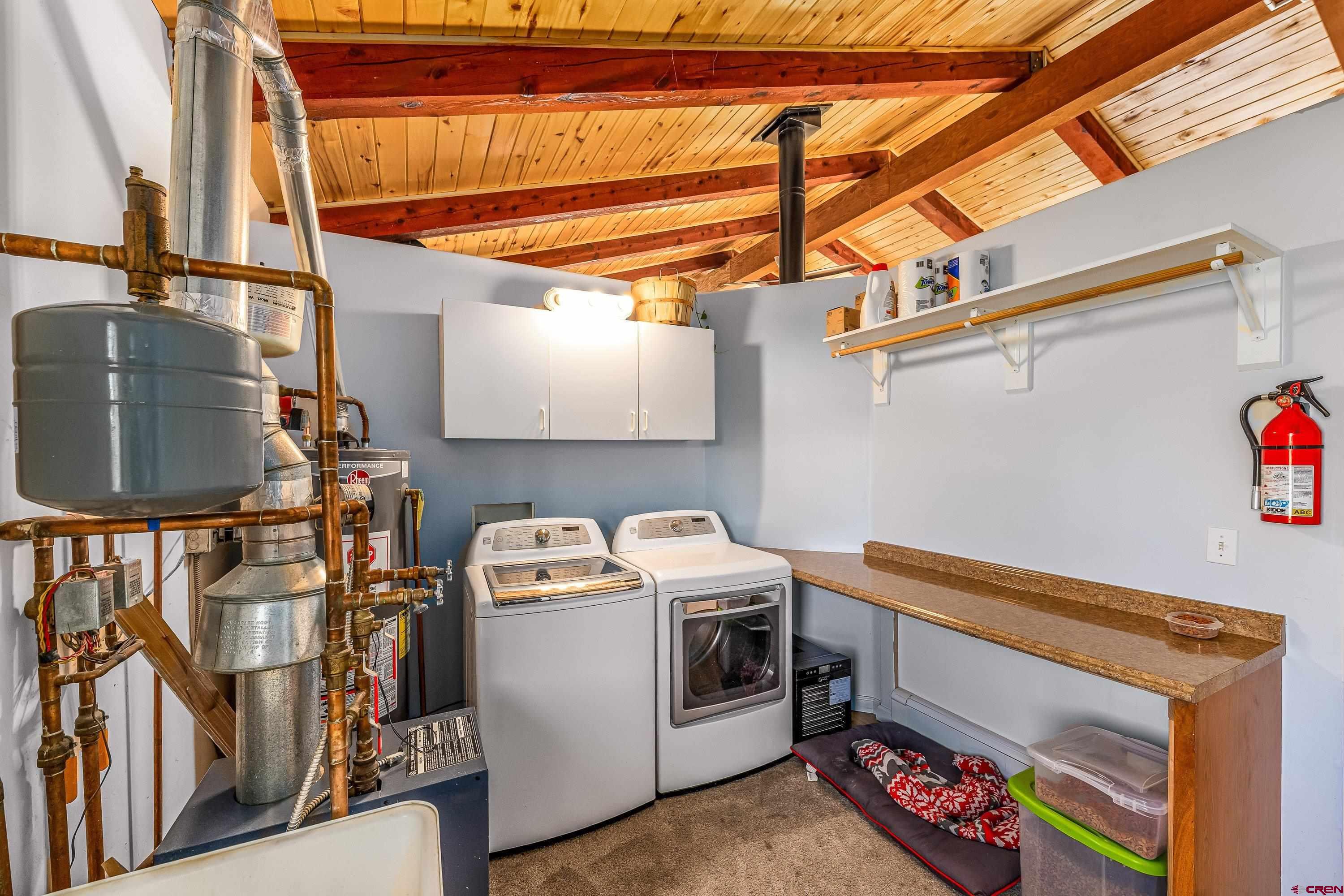 17938 B Road Delta, CO 81416 - Photo 15 of 41 a utility room with dryer and washer