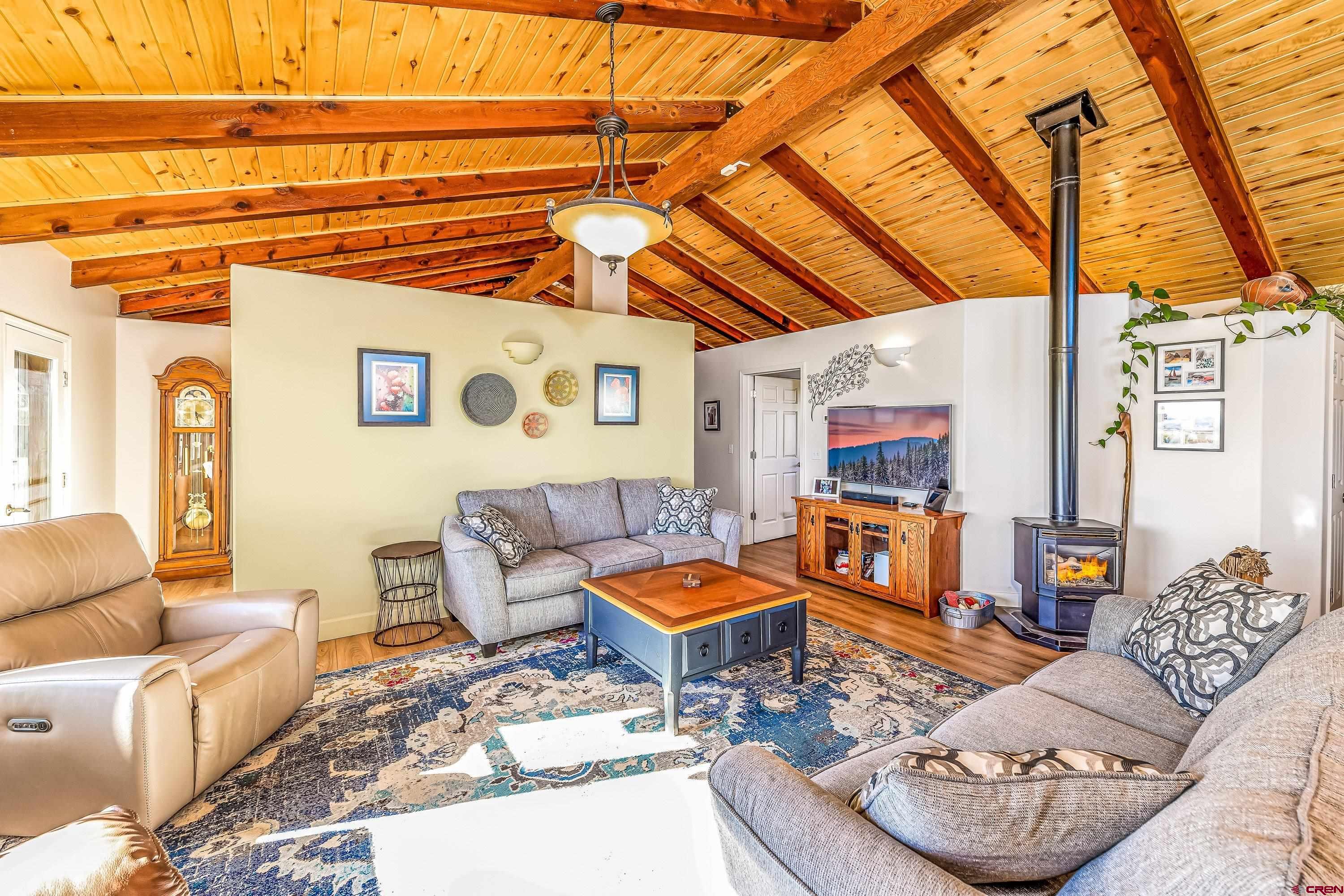 17938 B Road Delta, CO 81416 - Photo 16 of 41 a outdoor living space with furniture and a fireplace