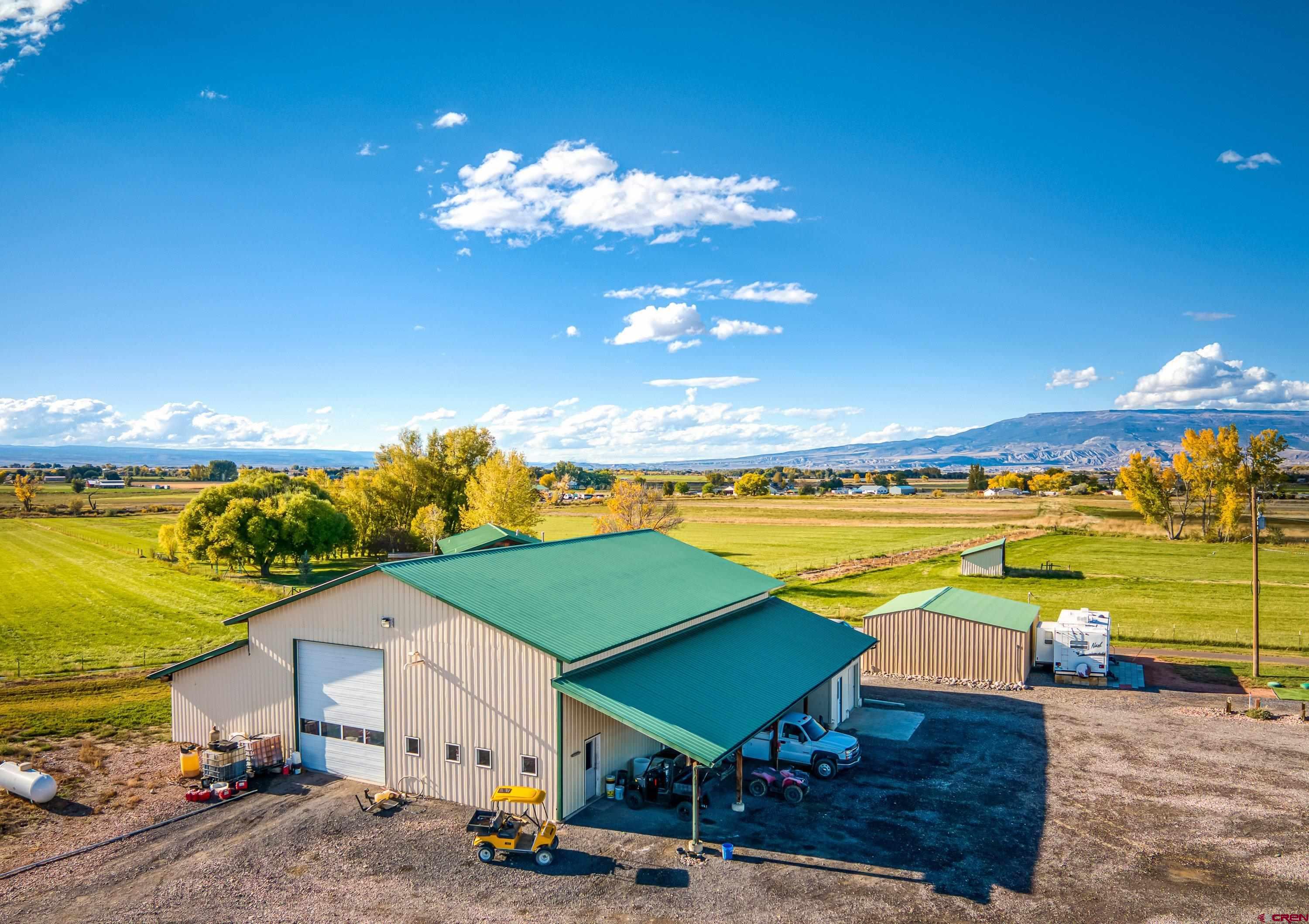 17938 B Road Delta, CO 81416 - Photo 19 of 41 a view of a swimming pool with an ocean view