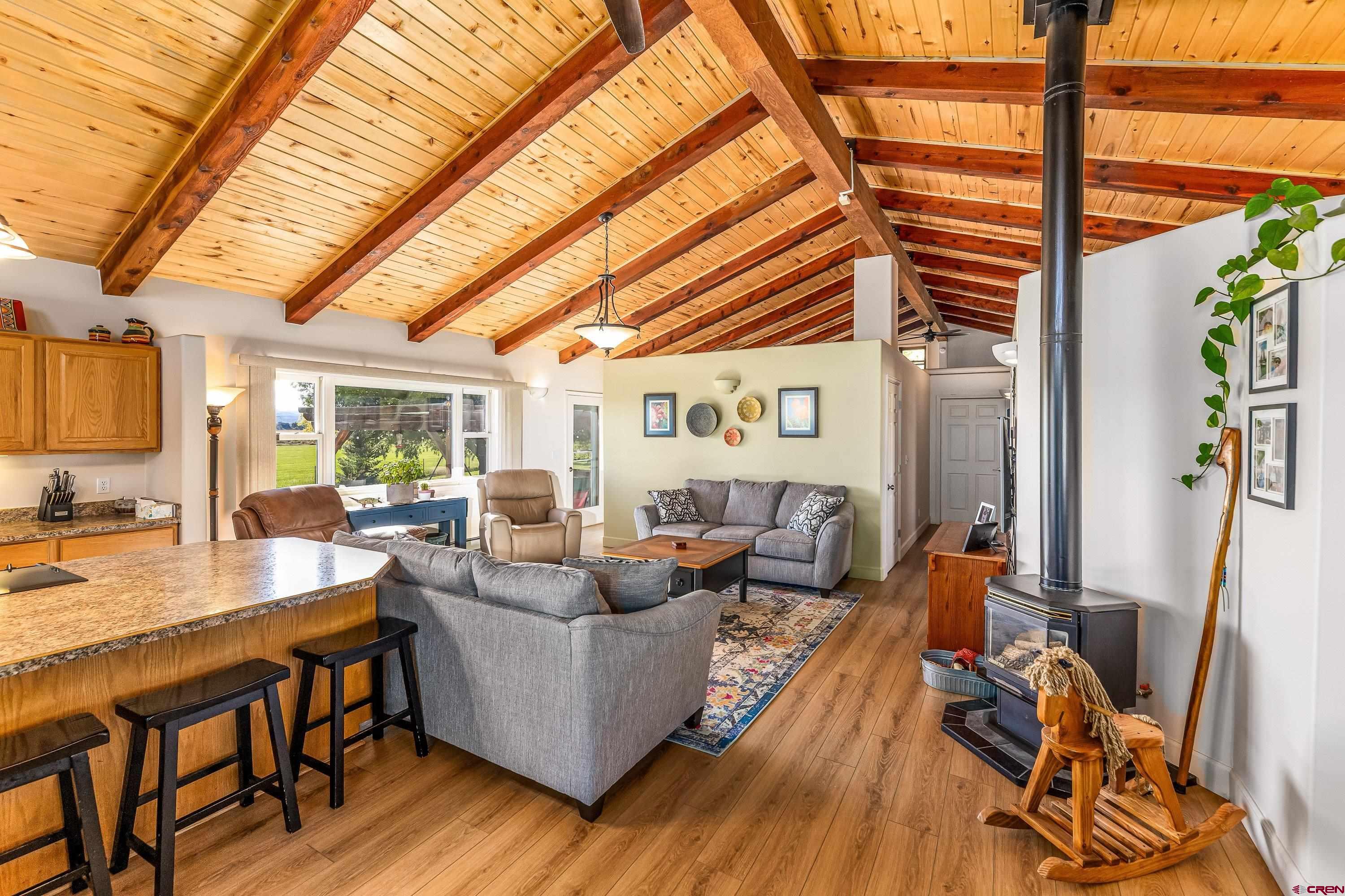17938 B Road Delta, CO 81416 - Photo 6 of 41 a living room with furniture and wooden floor