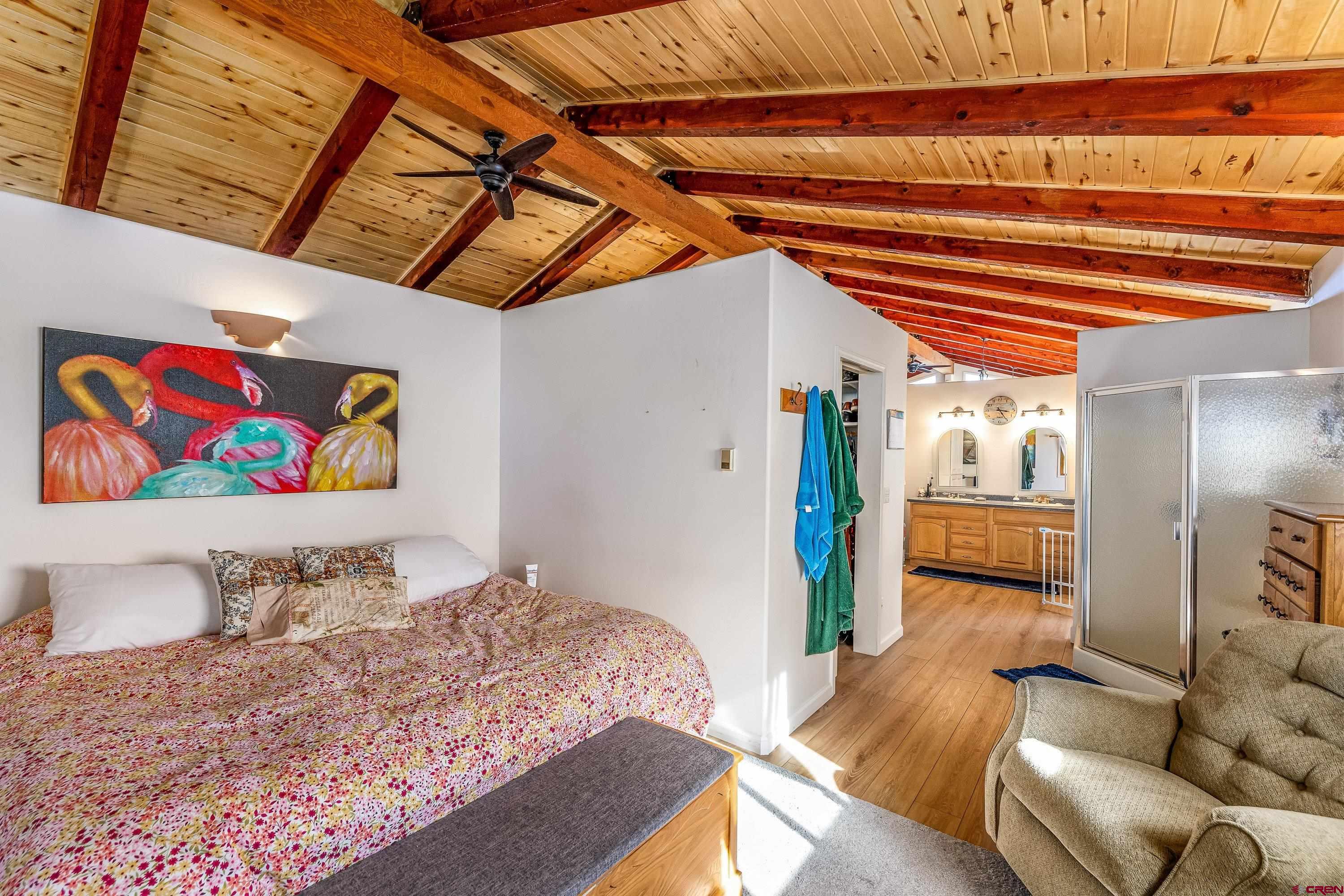 17938 B Road Delta, CO 81416 - Photo 10 of 41 a bedroom with furniture and a bed