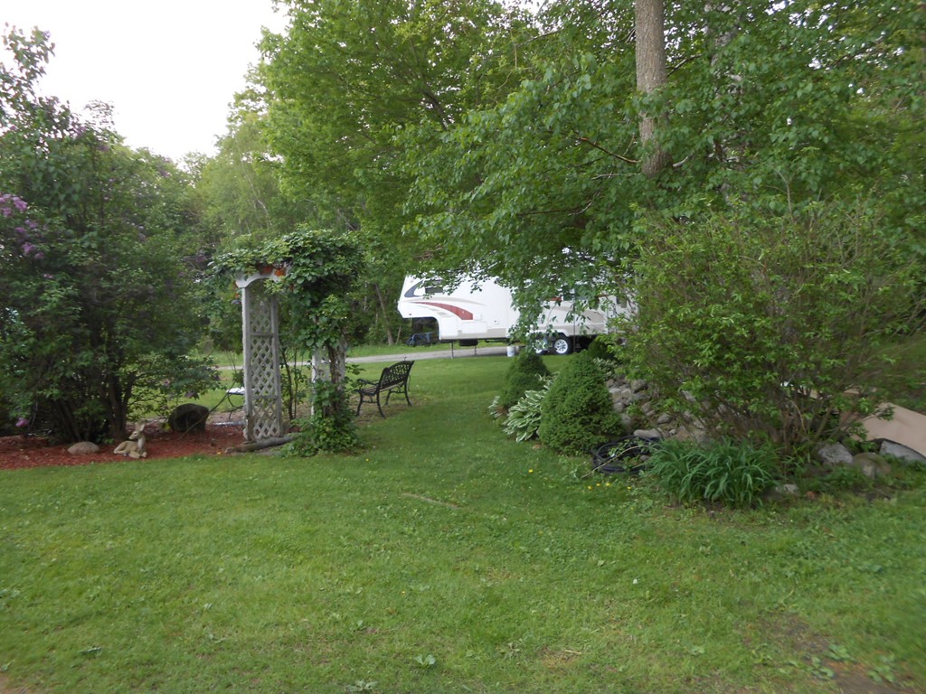 41 Corbin Road Dudley, MA 01571 - Photo 23 of 29 a big yard with lots of green space and plants