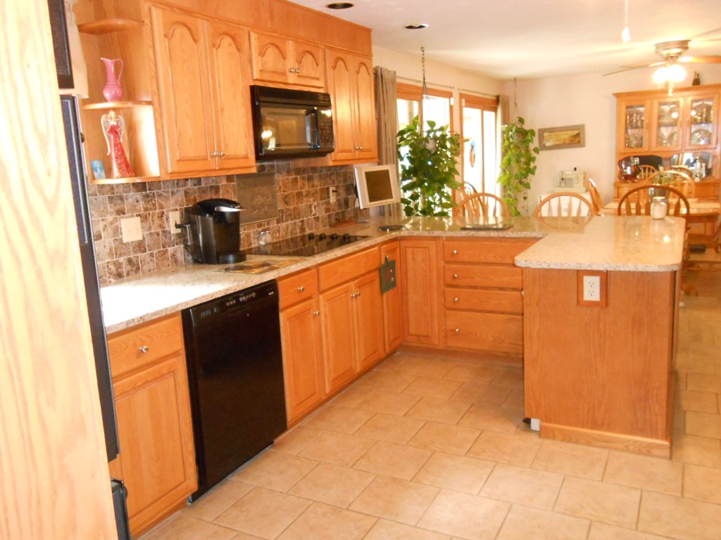 41 Corbin Road Dudley, MA 01571 - Photo 5 of 29 a kitchen with stainless steel appliances granite countertop a sink and cabinets