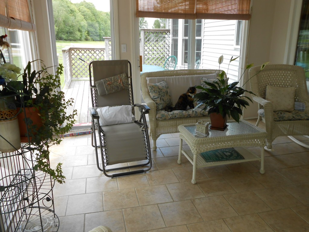 41 Corbin Road Dudley, MA 01571 - Photo 7 of 29 a living room with furniture a window and potted plants