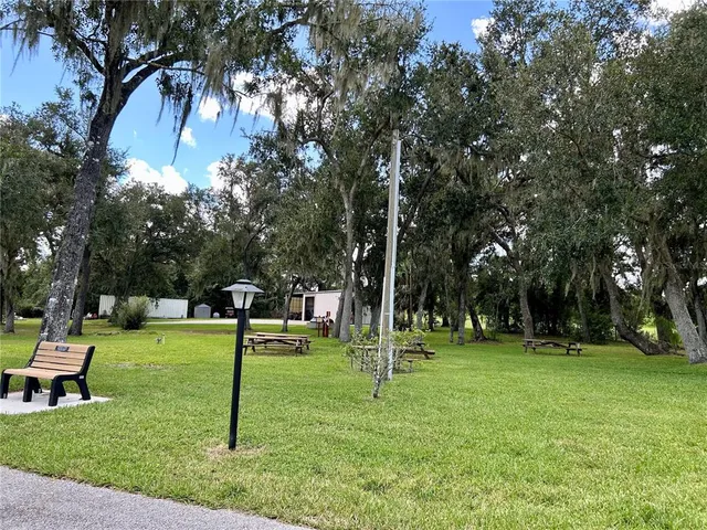 a view of a park with swings