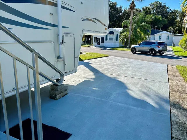 a view of the house with a swimming pool