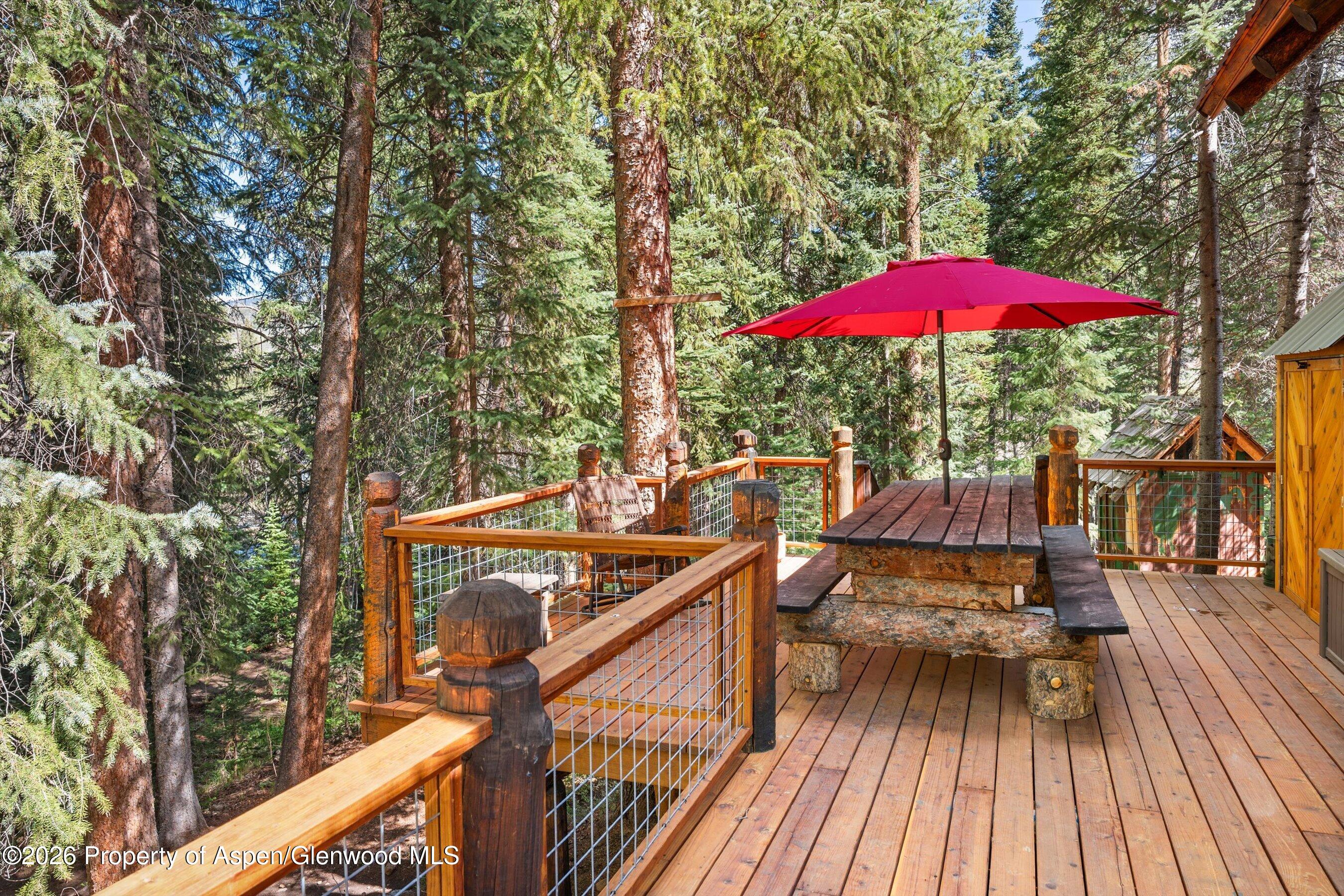 26608 Frying Pan Road Meredith, CO 81642 - Photo 14 of 49 a view of a balcony with a patio