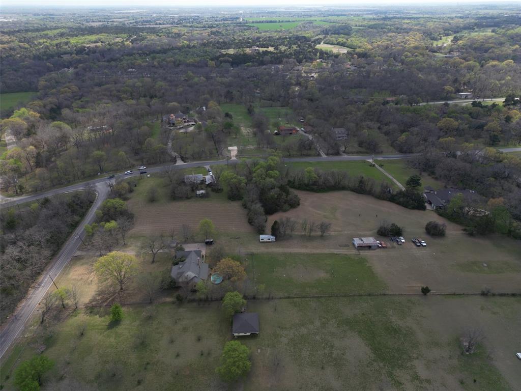 1505 West Main Street Lancaster, TX 75146 - Photo 13 of 19 an aerial view of a house with a yard