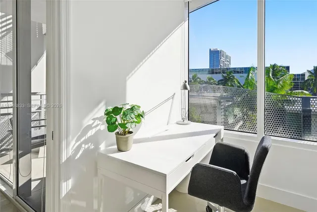 a view of a dining room with furniture window