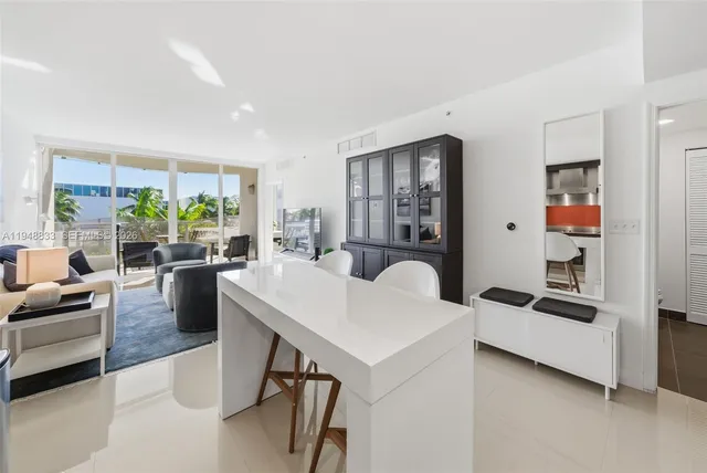 a living room with furniture and a table