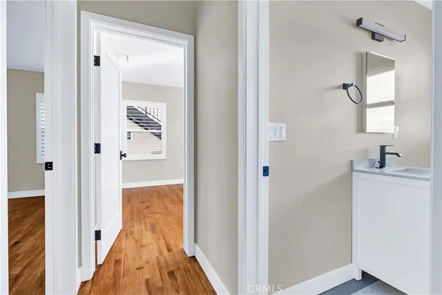 a view of a bathroom from the hallway