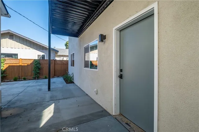 a view of a house with a street
