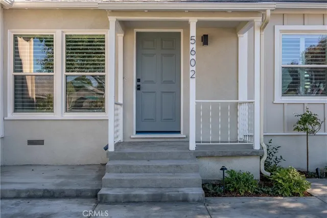 a front view of a house with a garage