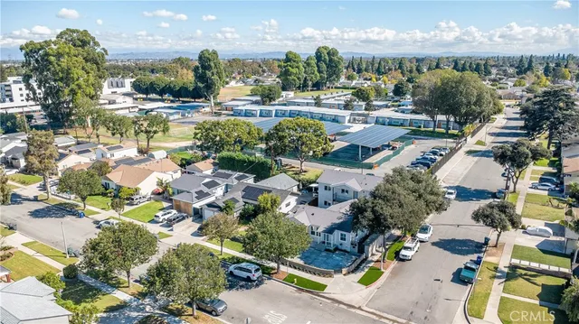 an aerial view of a house with outdoor space