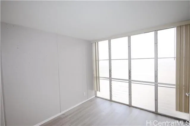 a view of a livingroom with wooden floor