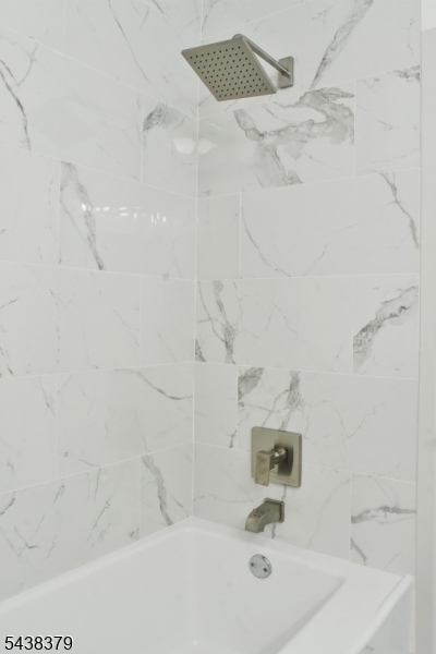 504 Edith Road Landing, NJ 07850 - Photo 16 of 28 a bath tub sitting next to a white sink