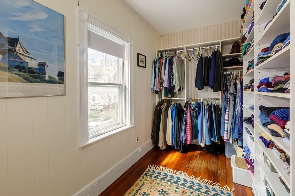 181 Willow Avenue Somerville, MA 02144 - Photo 20 of 31 a view of walk in closet with clothes and shoes