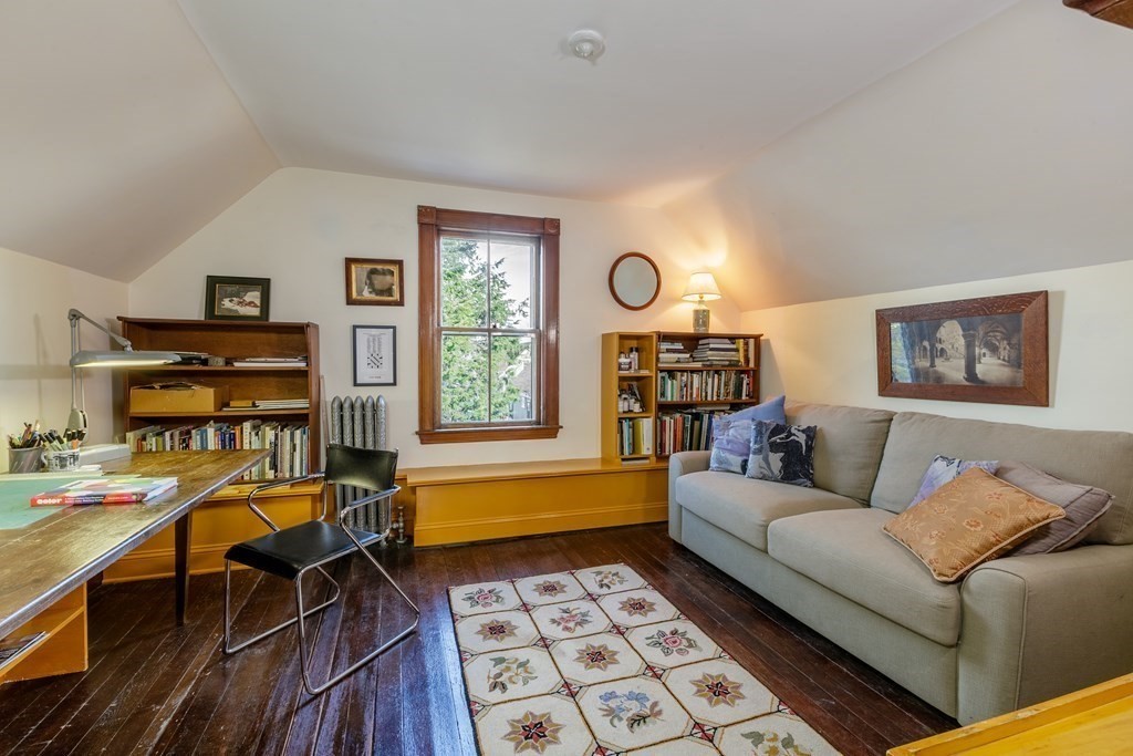 181 Willow Avenue Somerville, MA 02144 - Photo 24 of 31 a living room with furniture and a window