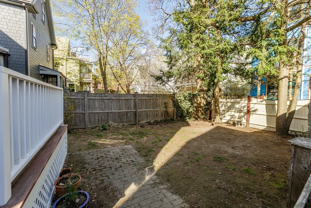 181 Willow Avenue Somerville, MA 02144 - Photo 28 of 31 a view of a yard with pathway