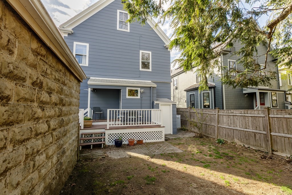 181 Willow Avenue Somerville, MA 02144 - Photo 29 of 31 a front view of a house with stairs