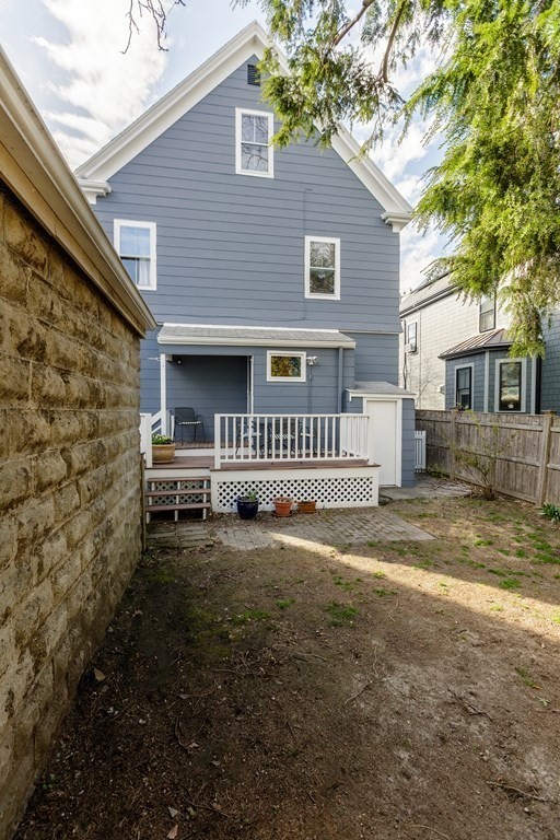 181 Willow Avenue Somerville, MA 02144 - Photo 30 of 31 a view of a house with a yard