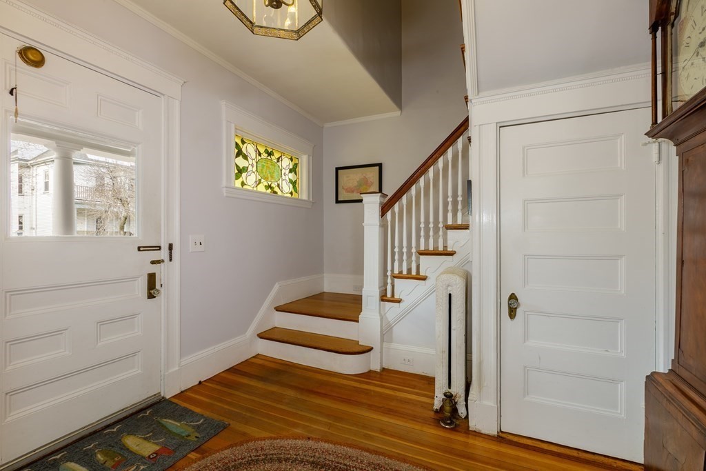 181 Willow Avenue Somerville, MA 02144 - Photo 4 of 31 a view of an entryway with staircase