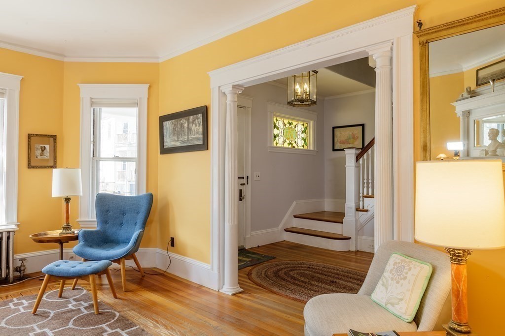 181 Willow Avenue Somerville, MA 02144 - Photo 6 of 31 a living room with furniture and a window