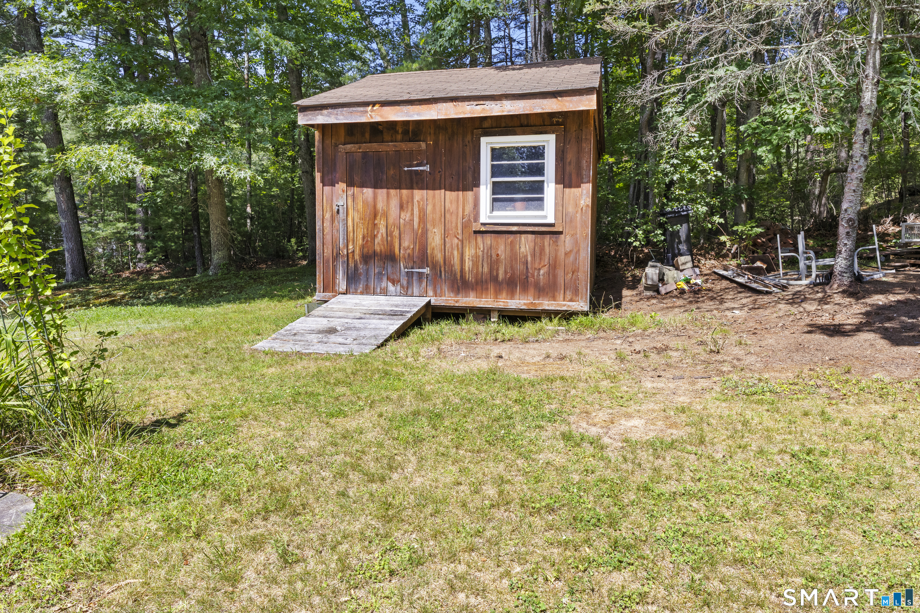 11 Munyan Road Putnam, CT 06260 - Photo 26 of 33 a backyard of a house with oven