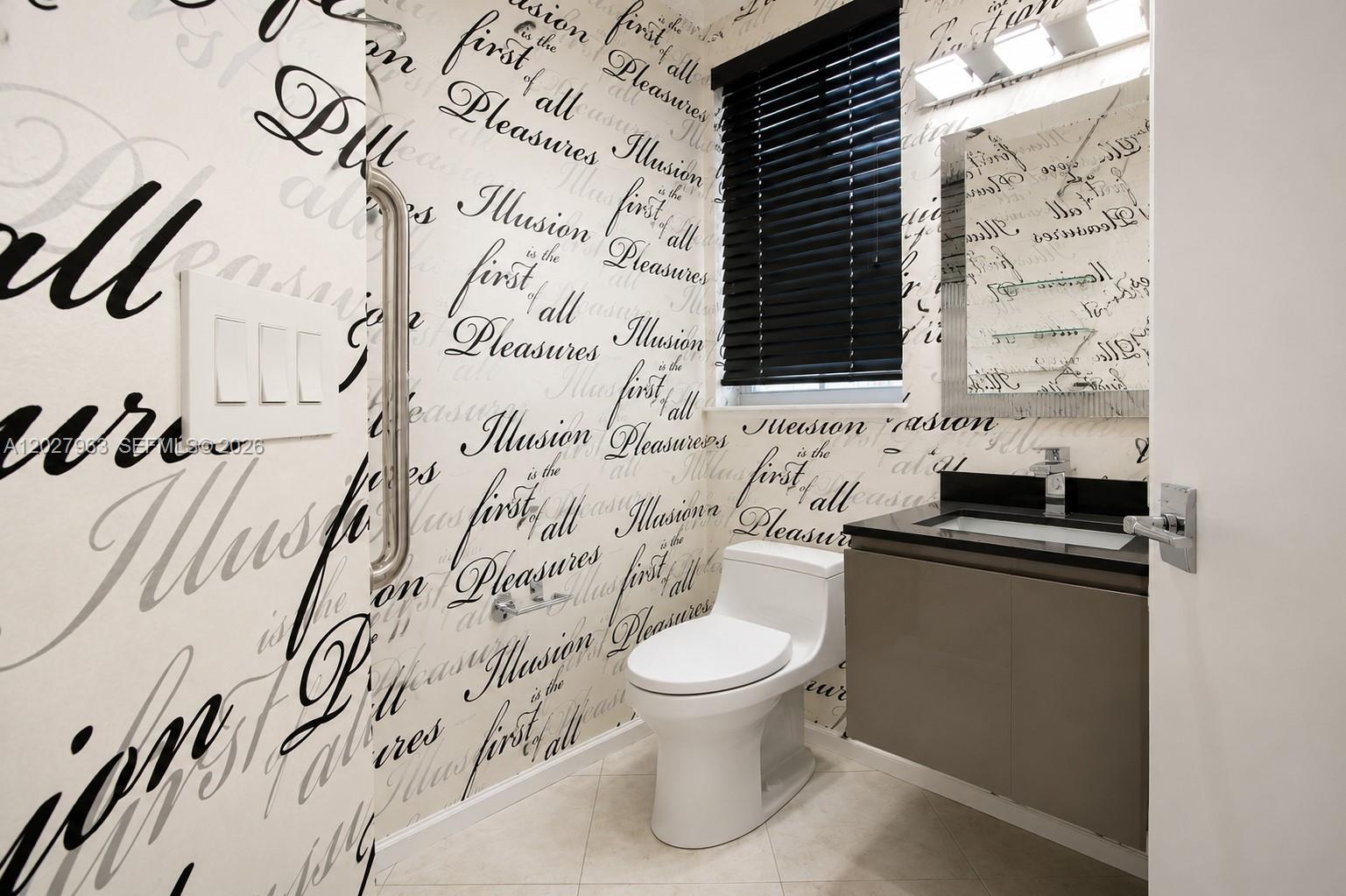 6646 Northwest 25th Terrace Boca Raton, FL 33496 - Photo 30 of 48 a bathroom with a granite countertop sink and a toilet