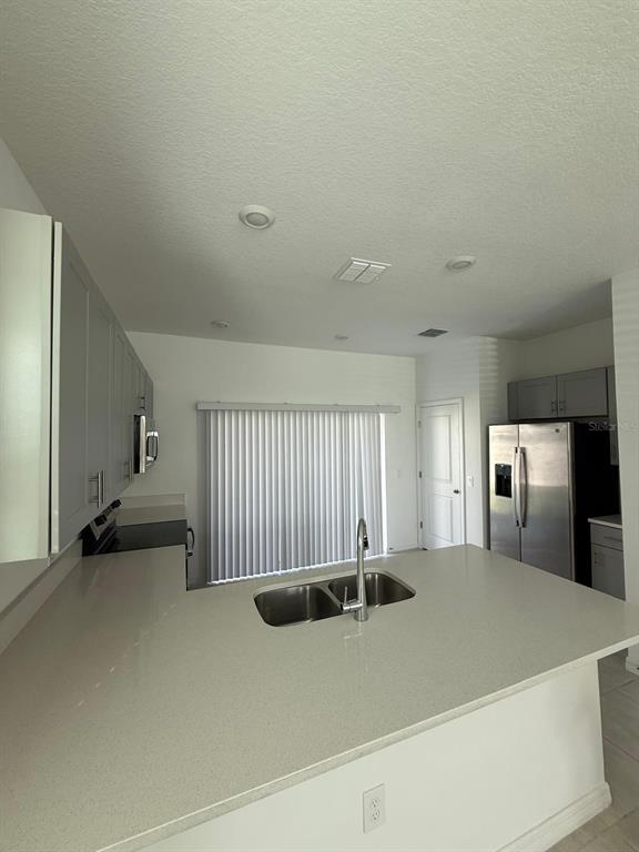 2953 Skyline Loop Kissimmee, FL 34758 - Photo 4 of 36