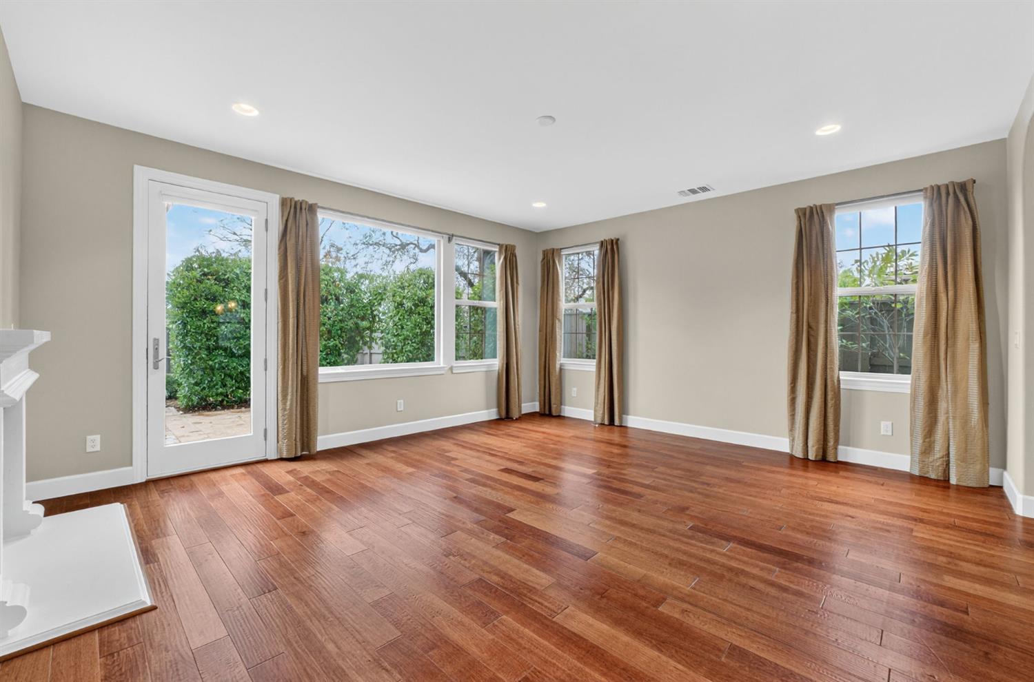 2050 Impressionist Way El Dorado Hills, CA 95762 - Photo 31 of 83 a view of an empty room with wooden floor and a window
