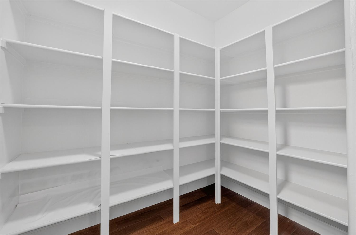 2050 Impressionist Way El Dorado Hills, CA 95762 - Photo 32 of 83 a view of an empty room with wooden floor and wooden floor