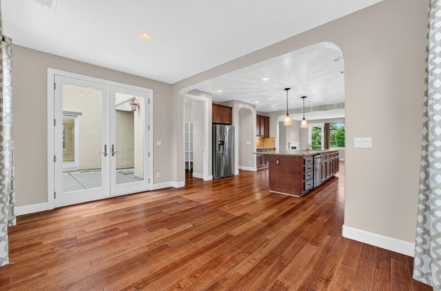 2050 Impressionist Way El Dorado Hills, CA 95762 - Photo 34 of 83 a room with wooden floor and windows
