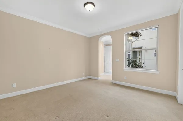 a spacious bathroom with a tub sink shower and mirror