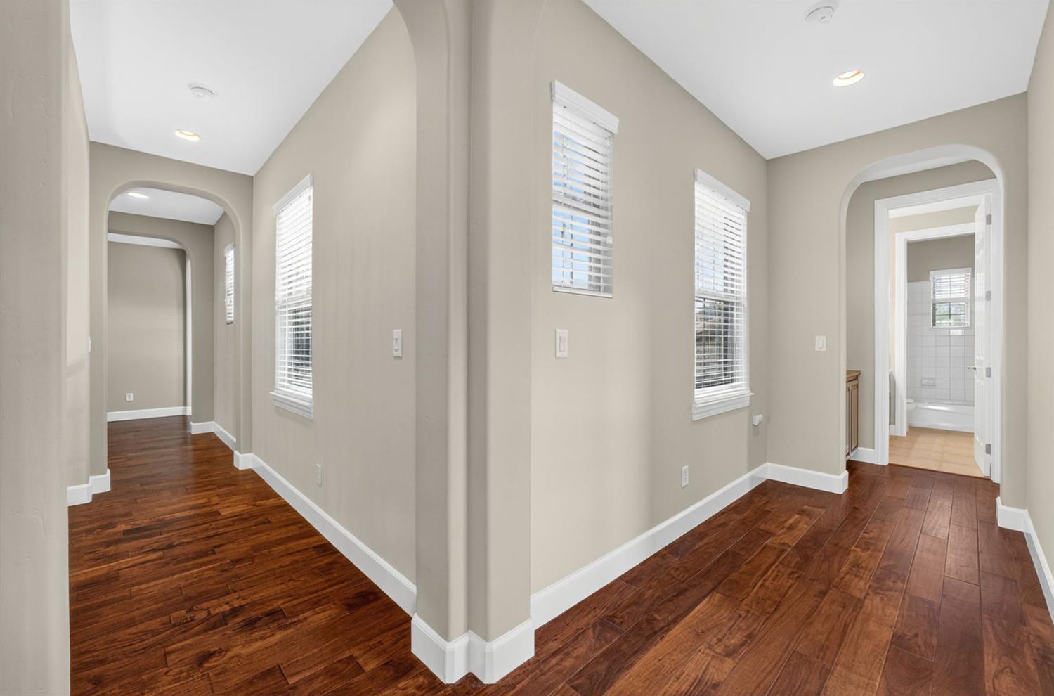 2050 Impressionist Way El Dorado Hills, CA 95762 - Photo 47 of 83 a view of a hallway with wooden floor and stairs