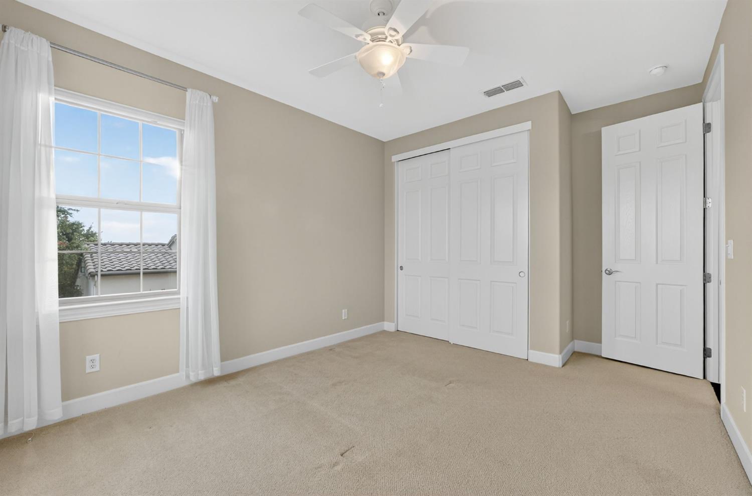 2050 Impressionist Way El Dorado Hills, CA 95762 - Photo 52 of 83 a view of an empty room with a window