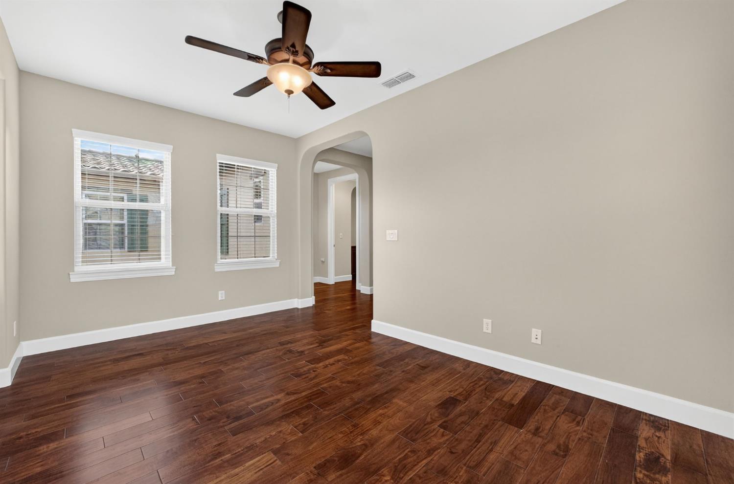 2050 Impressionist Way El Dorado Hills, CA 95762 - Photo 57 of 83 a view of an empty room with window and wooden floor