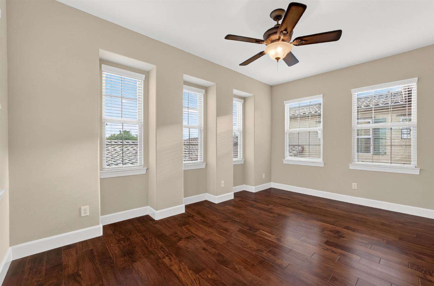 2050 Impressionist Way El Dorado Hills, CA 95762 - Photo 58 of 83 a view of an empty room with window and wooden floor