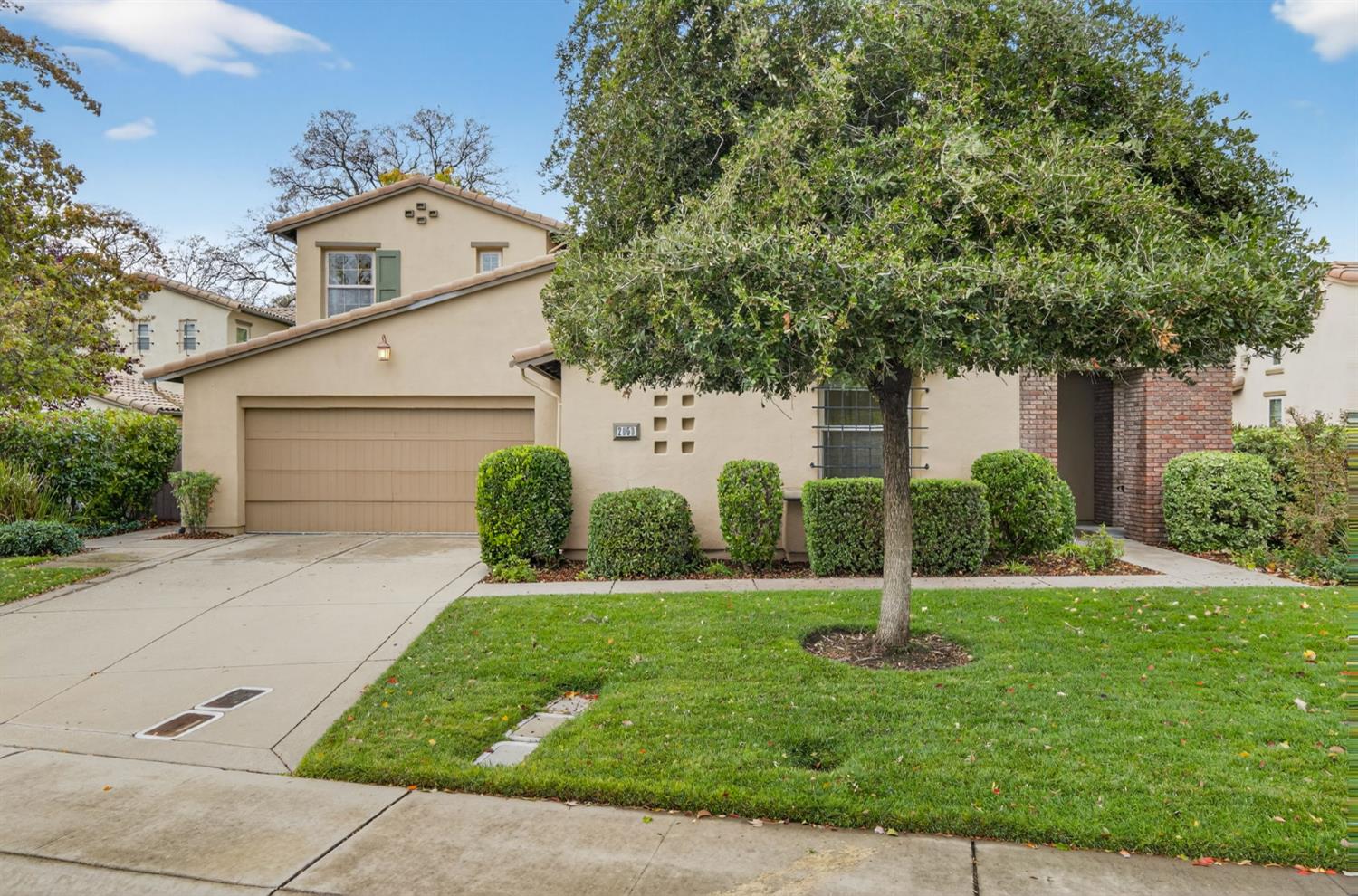 2050 Impressionist Way El Dorado Hills, CA 95762 - Photo 6 of 83 a front view of a house with a yard