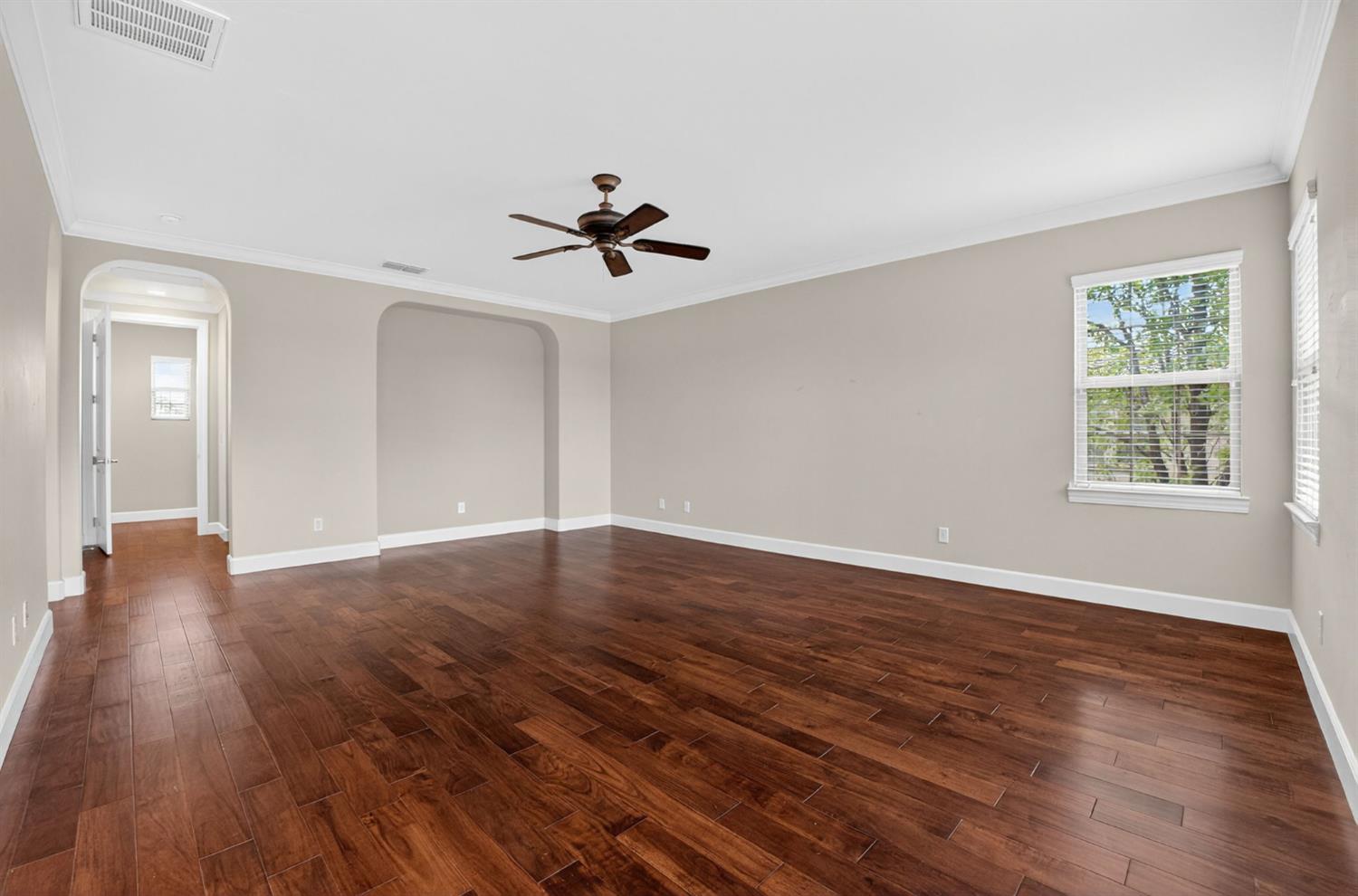 2050 Impressionist Way El Dorado Hills, CA 95762 - Photo 61 of 83 a view of empty room with wooden floor and fan